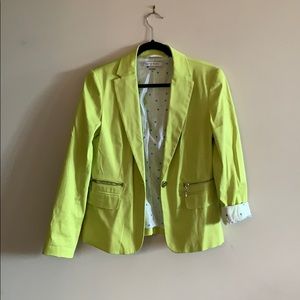 Bright green blazer.